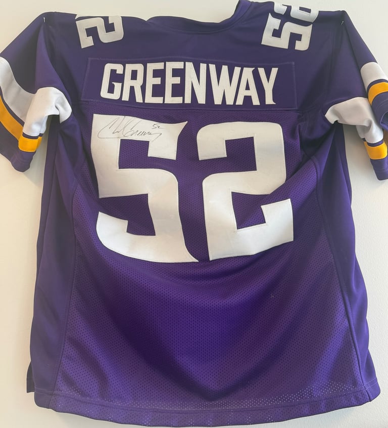 Purple Minnesota Vikings jersey number 52 with Greenway name and signature displayed on white background