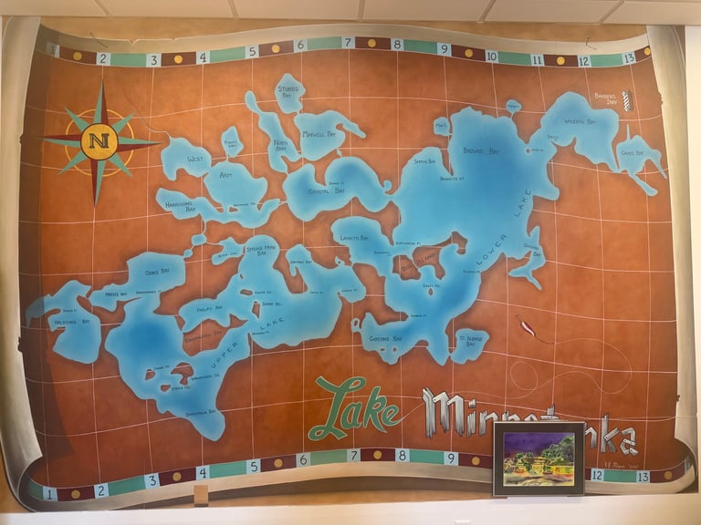Map of Lake Minneiska with compass rose on orange tile background with decorative border and small landscape illustration